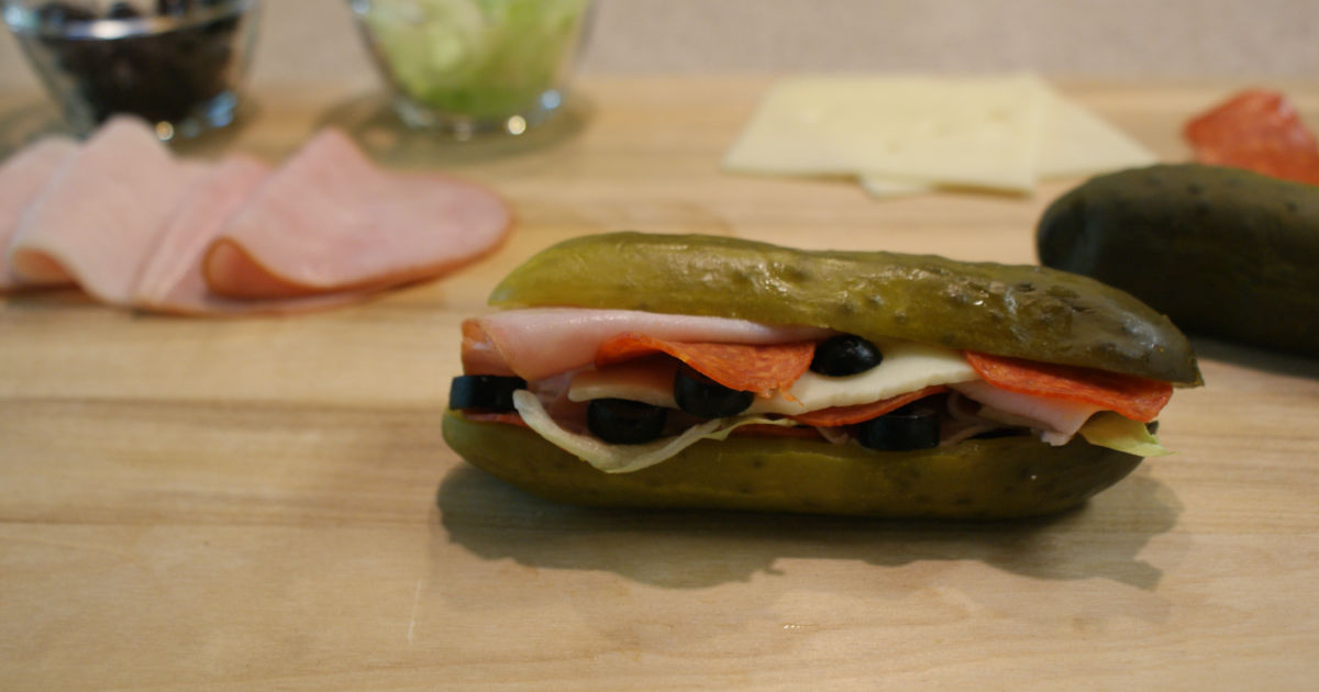 pickle sandwich on a cutting board