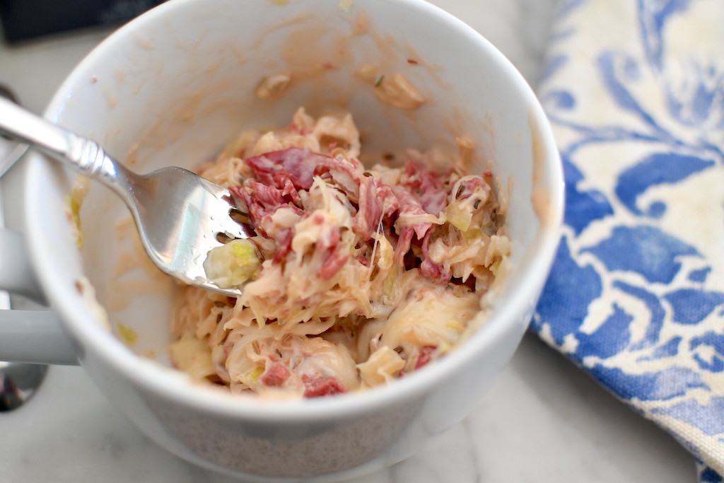 fork getting helping of keto Reuben in a mug