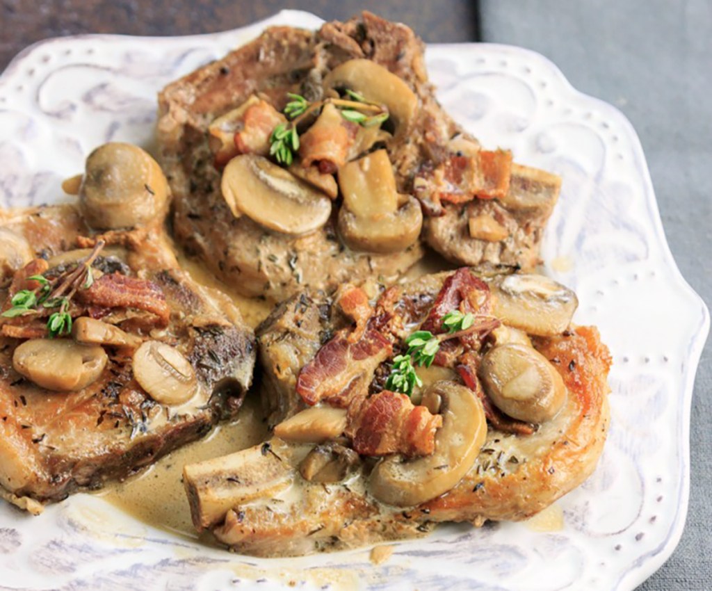 smothered pork chops from beauty and the foodie