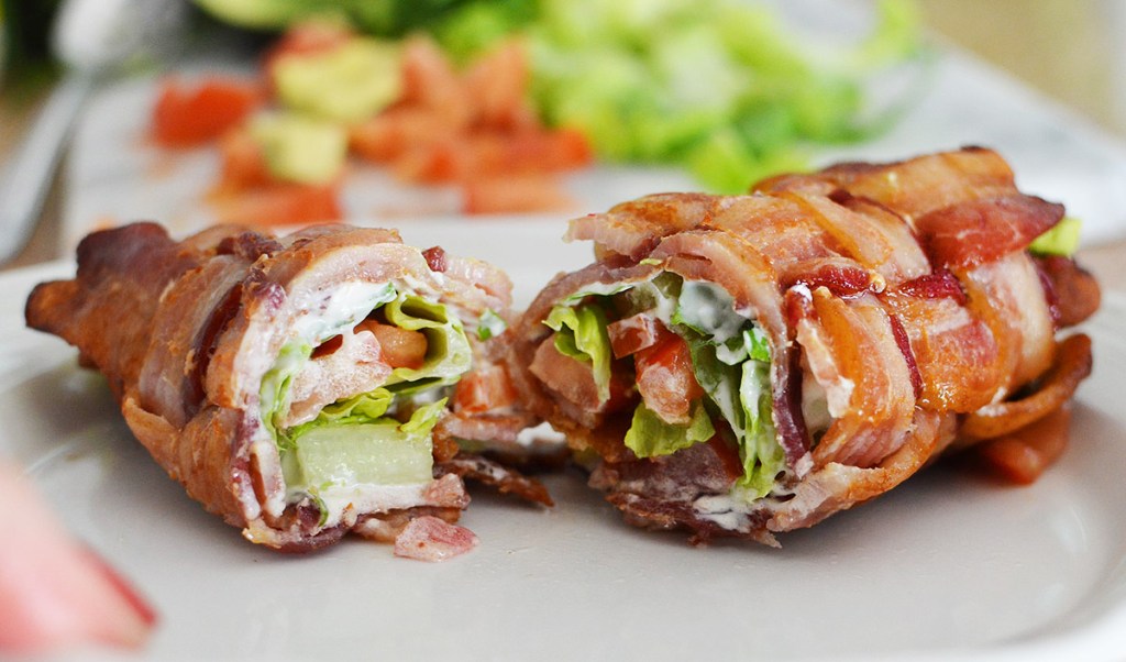 keto bacon sushi roll cut in half