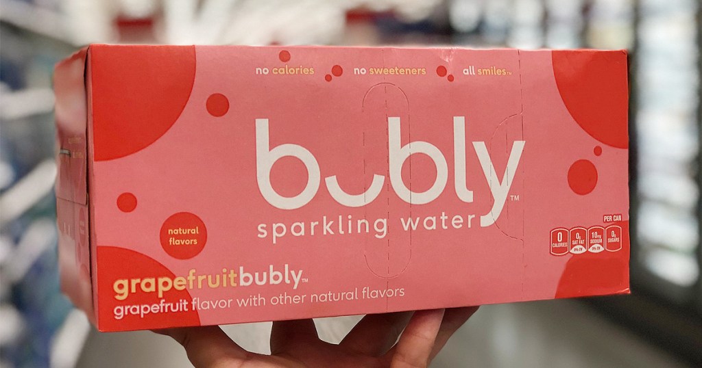 hand holding carton of bubly sparkling water