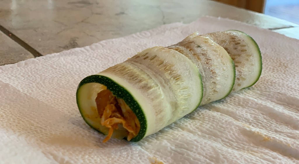 zucchini roll with chicken enchilada filling