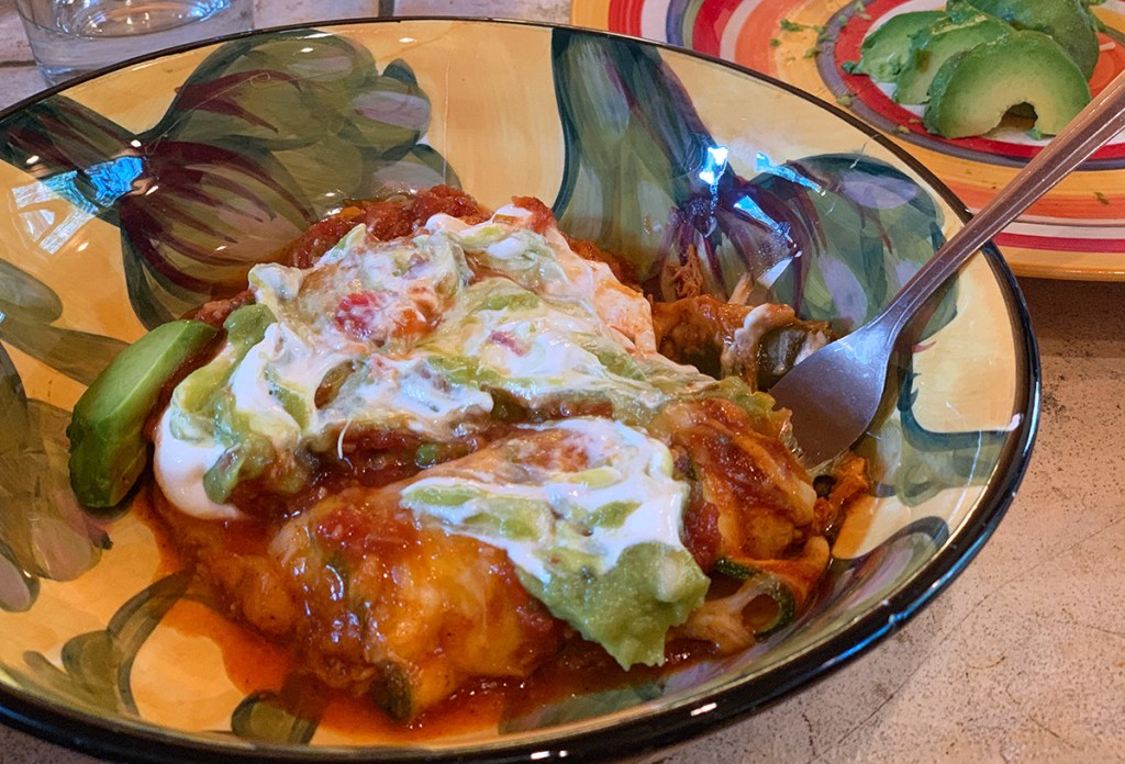 keto zucchini enchilada with sour cream and guacamole