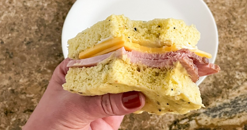 holding a sandwich with 90-second keto bread