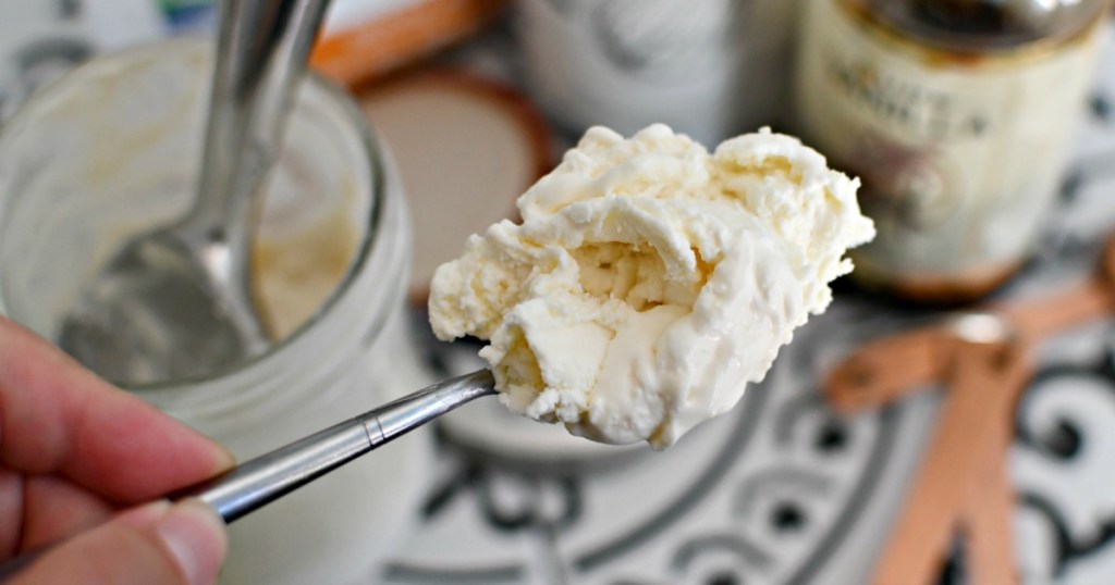 a spoonful of keto ice cream in a jar