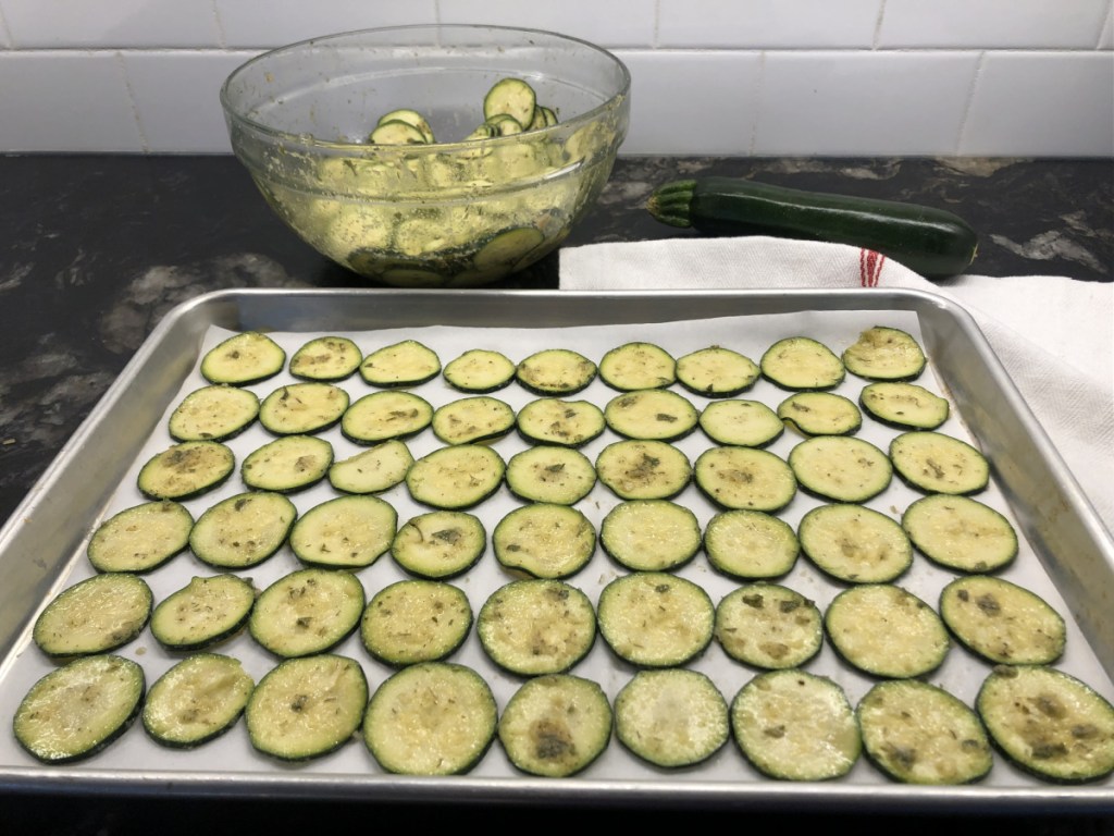 keto zucchini chips on baking sheet
