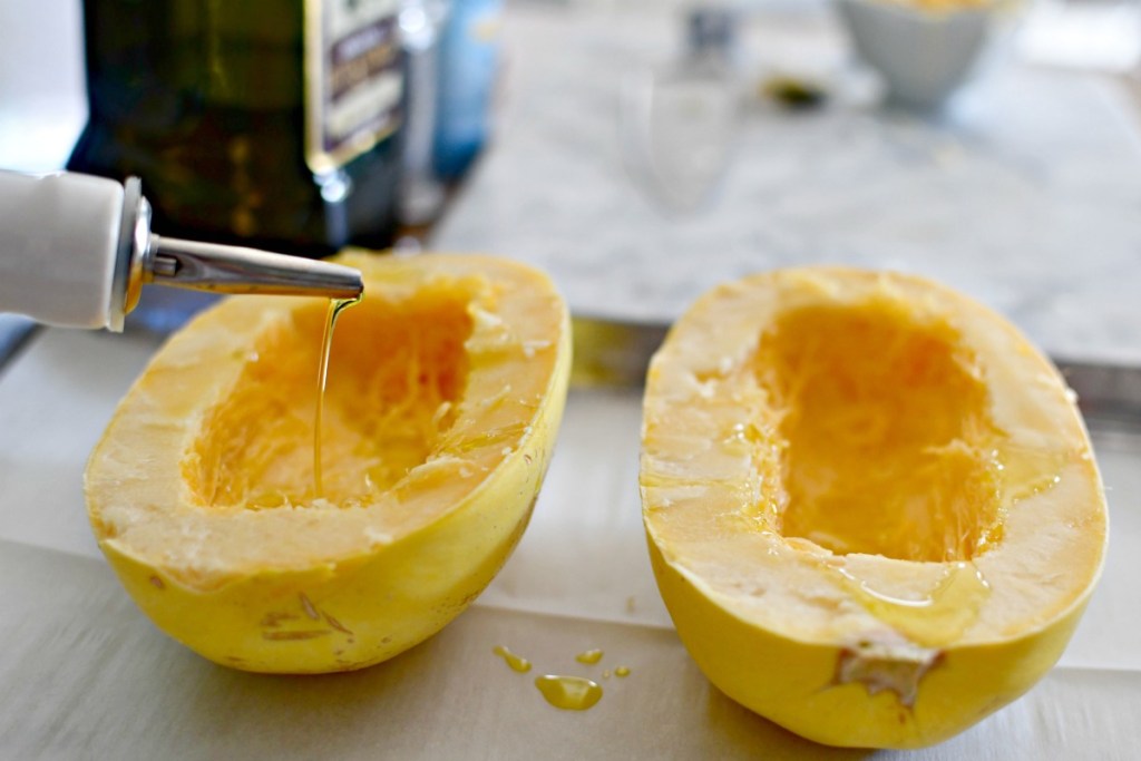 olive oil on a spaghetti squash