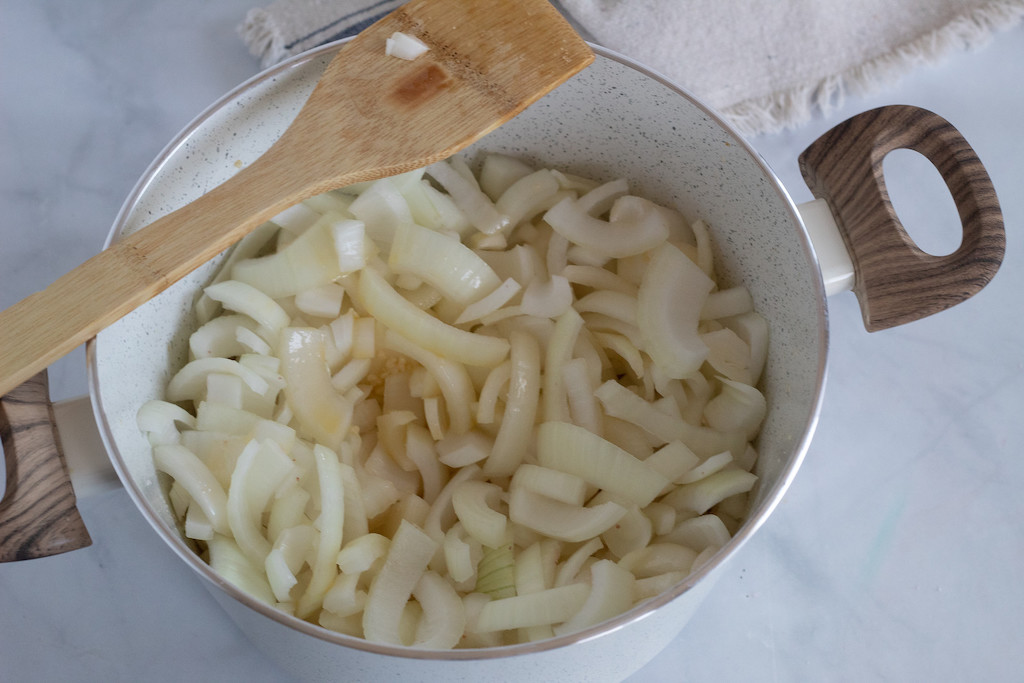 pot filled with sliced onions 