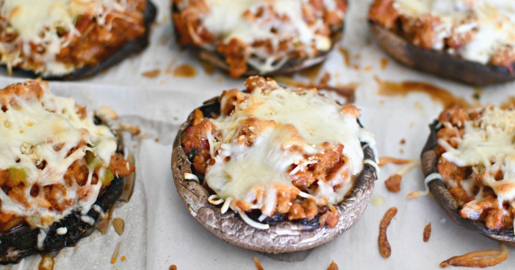 pan of sausage stuffed peppers with cheese 