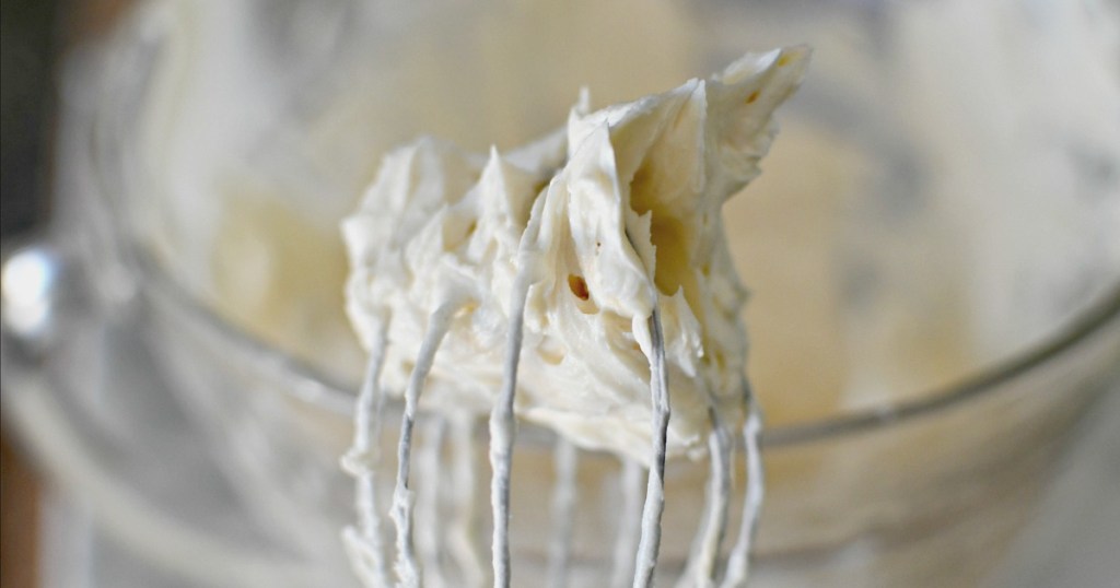 vanilla keto frosting on a whisk