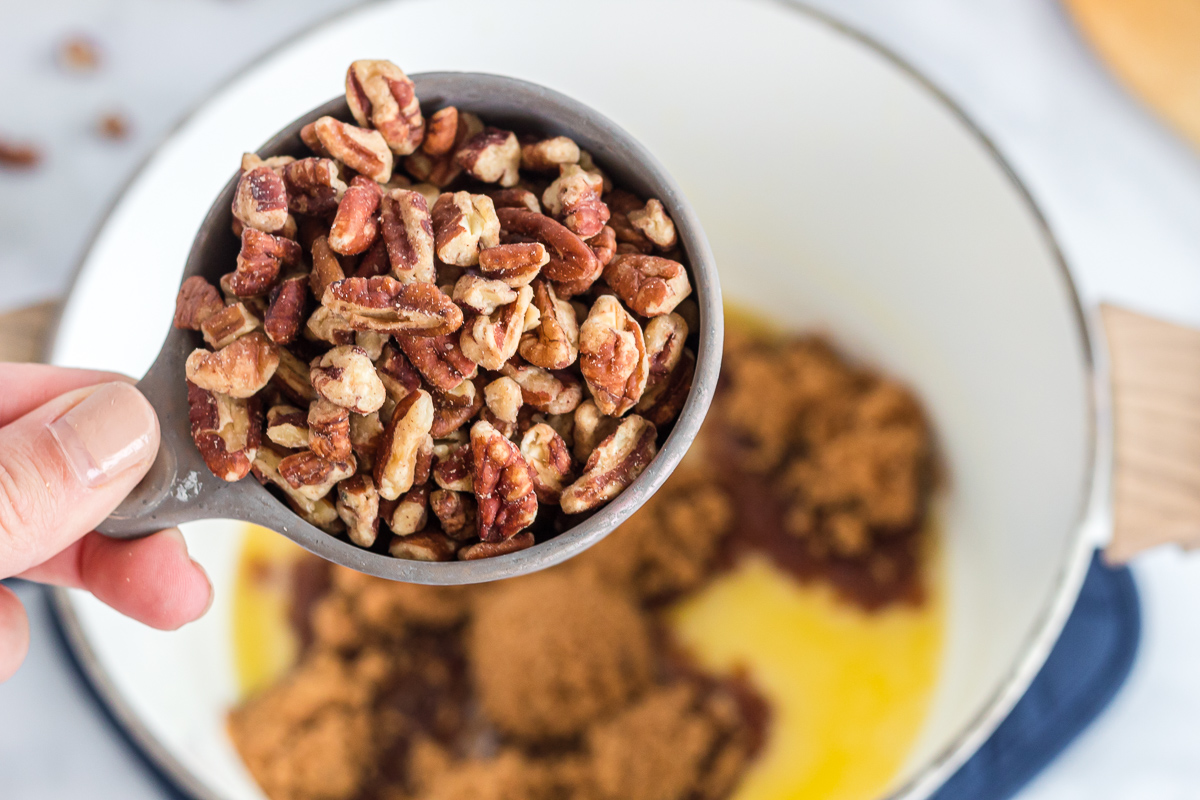 adding pecans to pie filling