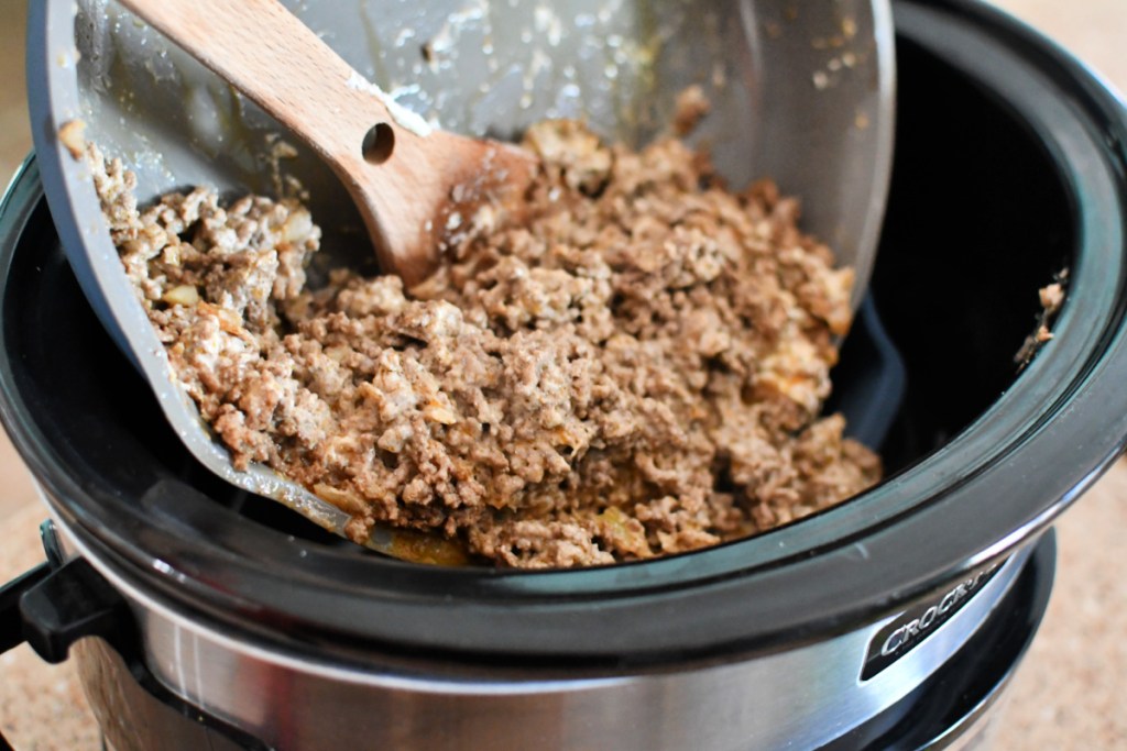 adding taco ground beef to slow cooker