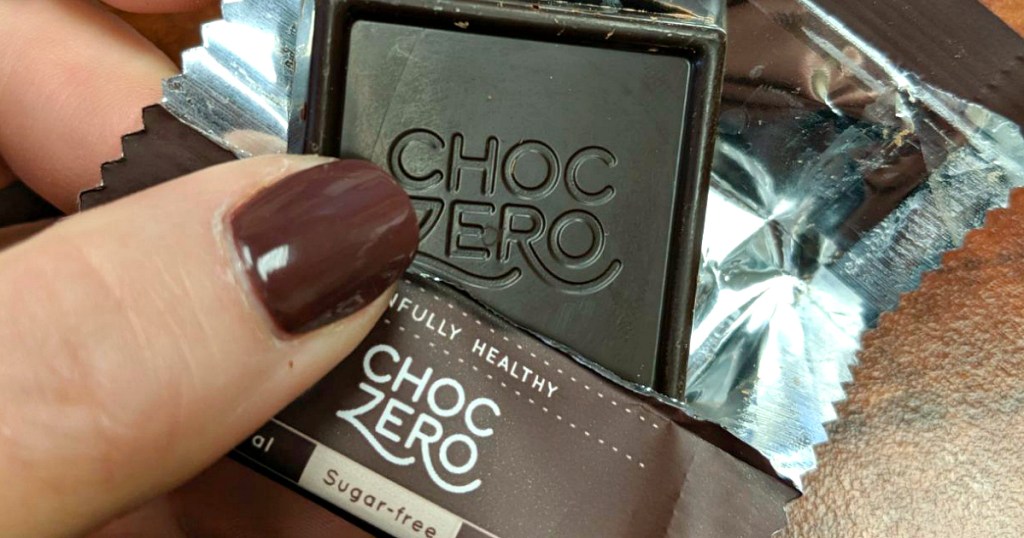 holding ChocZero candy square