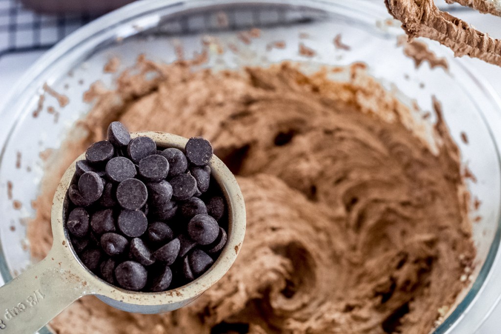 chocolate chips going Into mixing bowl