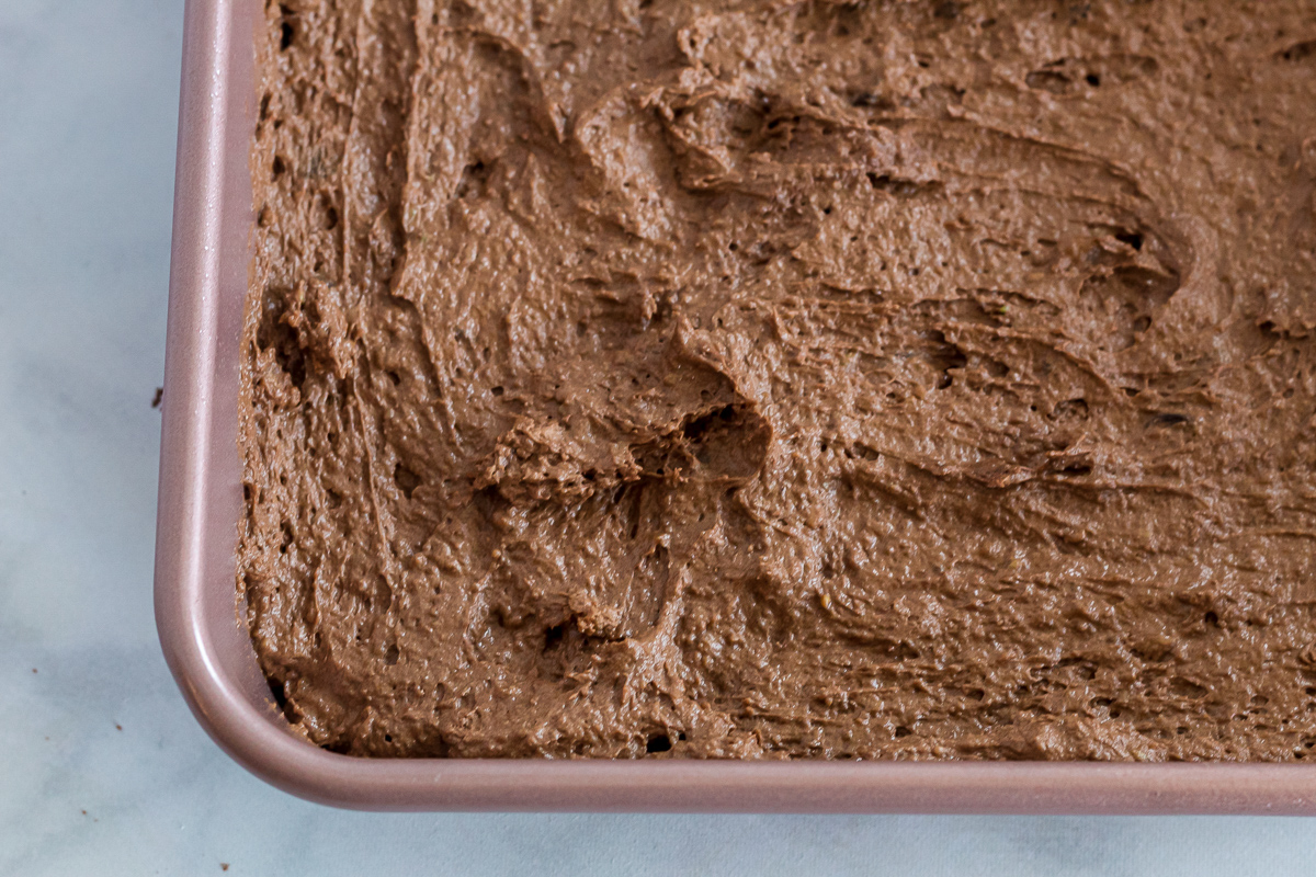 brownie batter in a baking pan