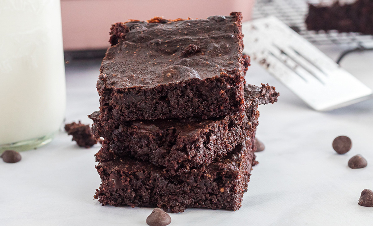 Keto Avocado Brownies stacked on top of each other 