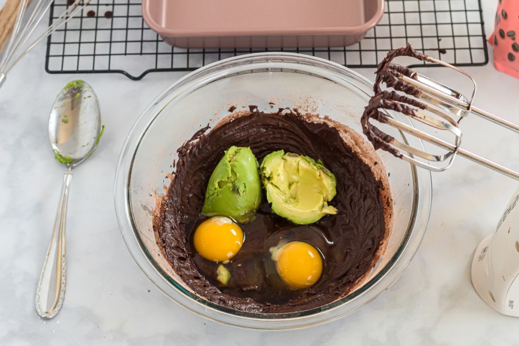 avocado and eggs in brownie mixing bowl
