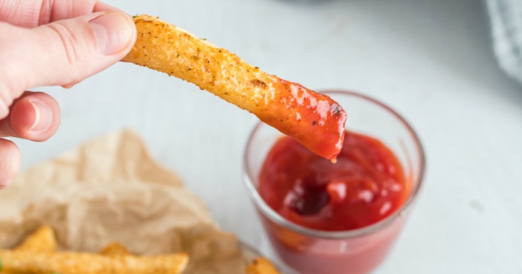 dipping keto fries in low-sugar ketchup