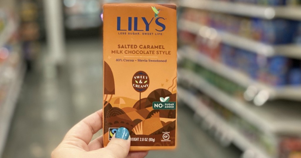 holding Lilys salted caramel chocolate bar 