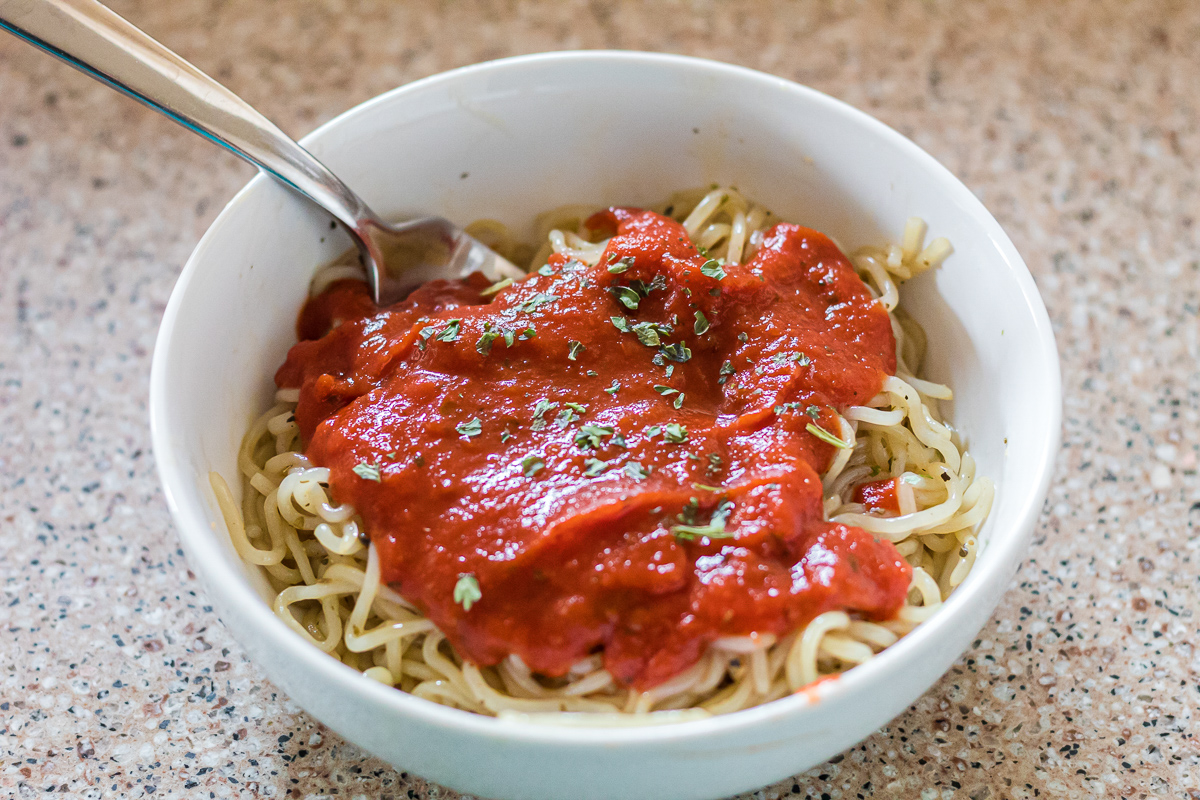 bowl of shirataki noodles with spaghetti sauce