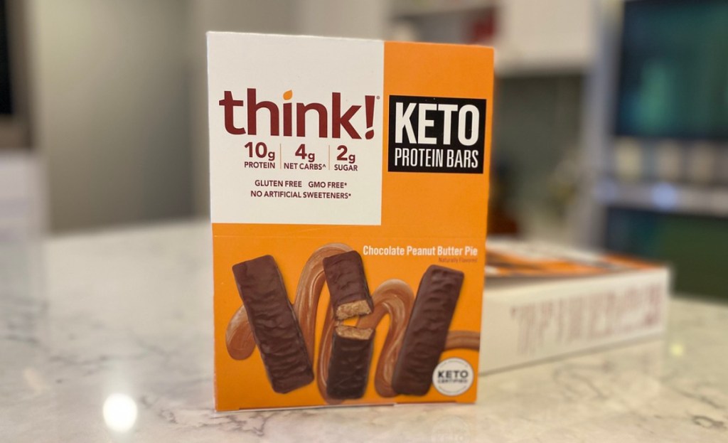 A box of protein bars on a kitchen counter