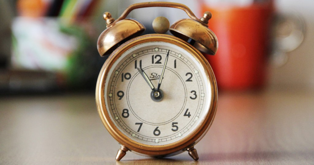 clock sitting on a desk