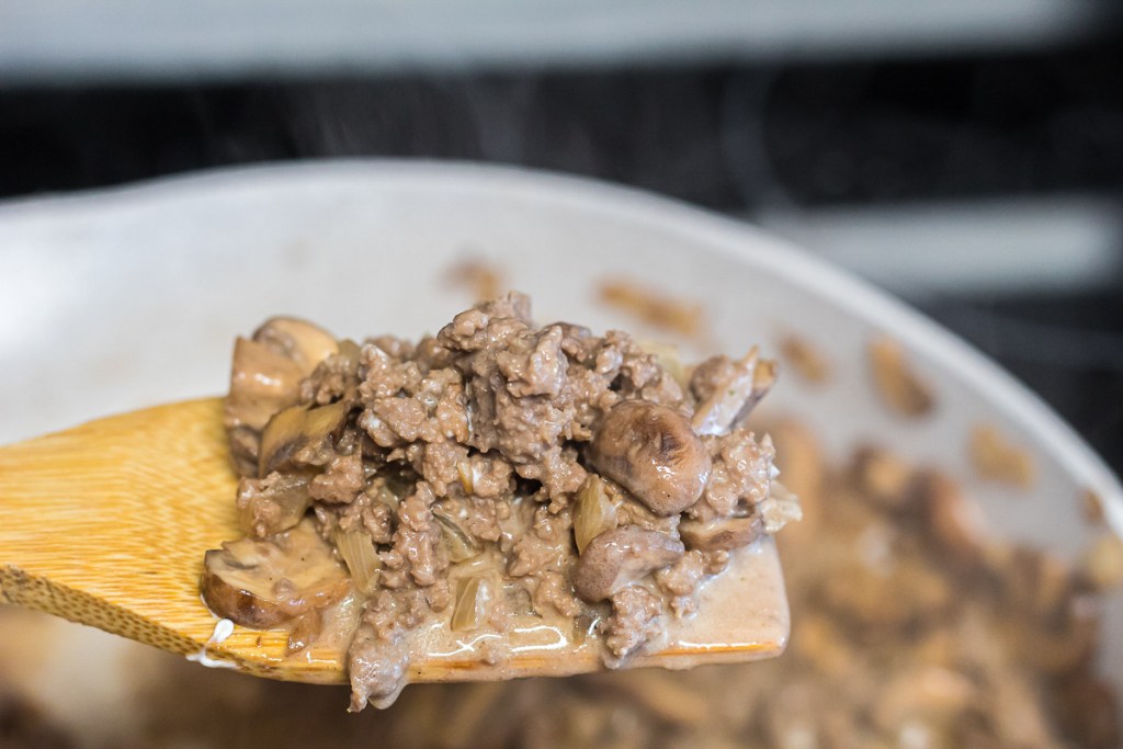 close up of beef stroganoff on spoon