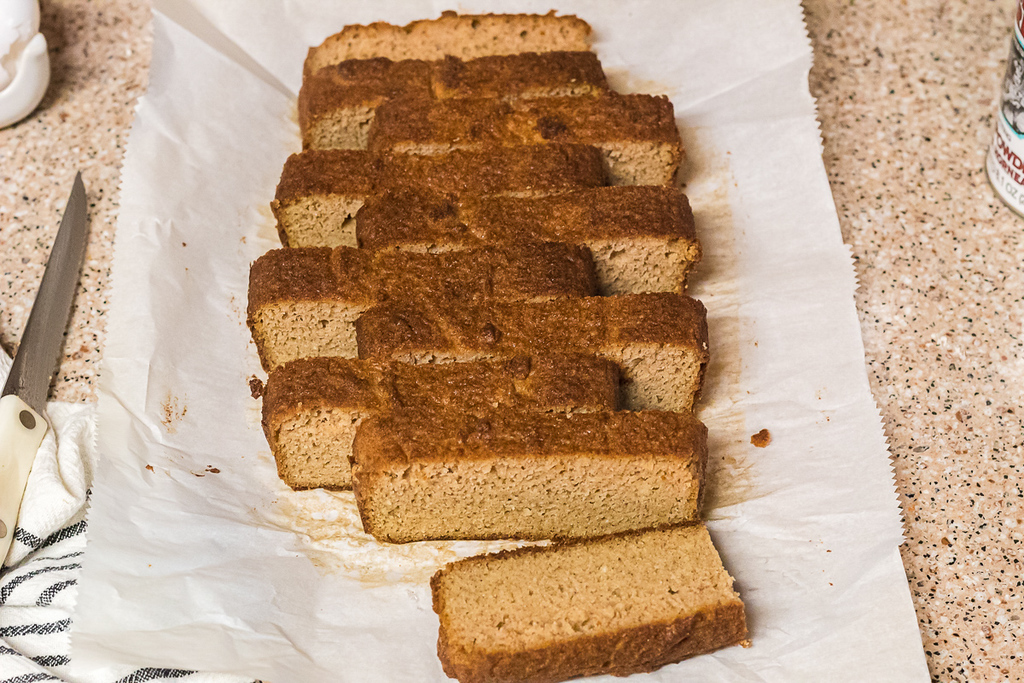 keto bread sliced up on parchment paper