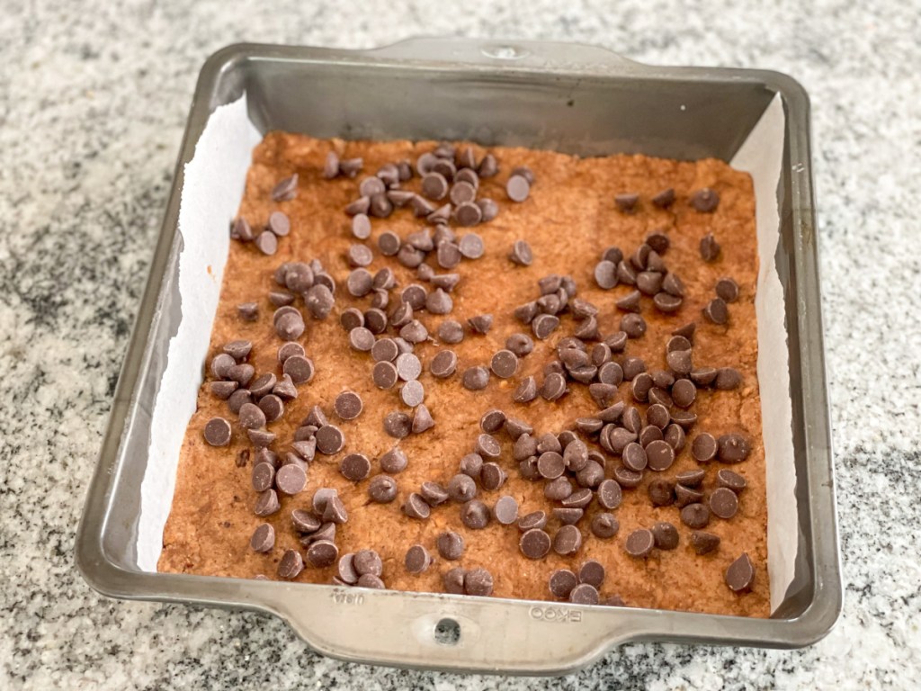 adding keto chocolate chips to cookie dough protein bars 