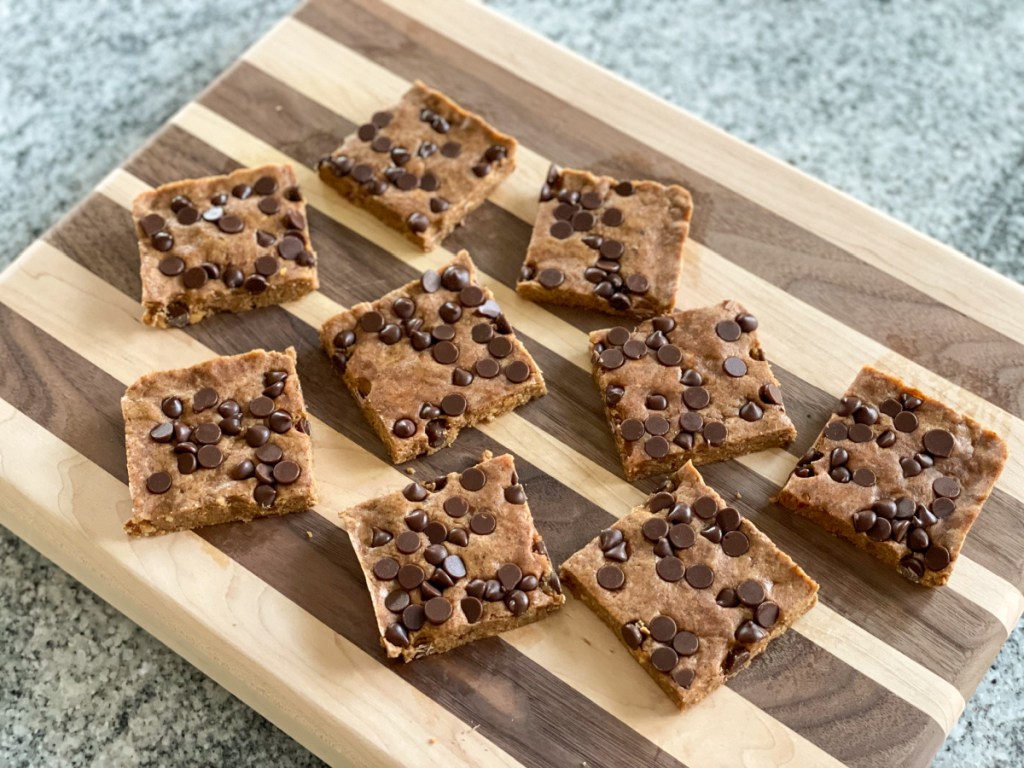cookie dough protein bar on a cutting board