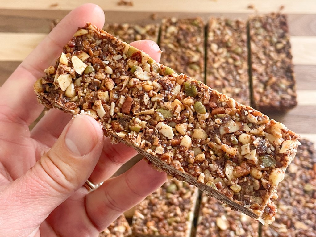 sliced keto granola bars, holidng one