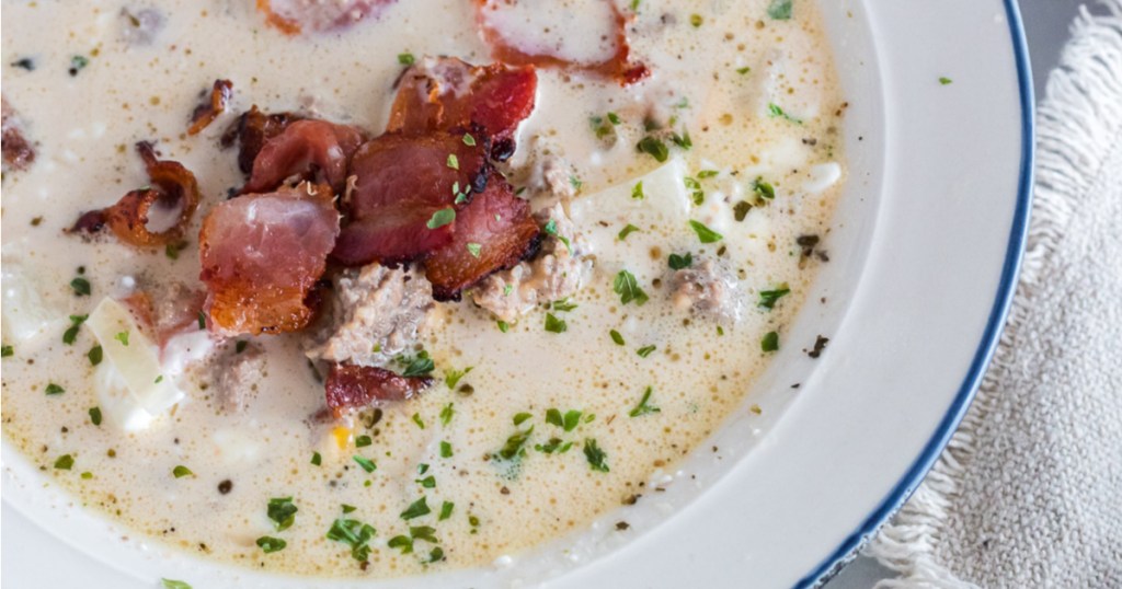 cheeseburger soup with bacon close up in a bowl 