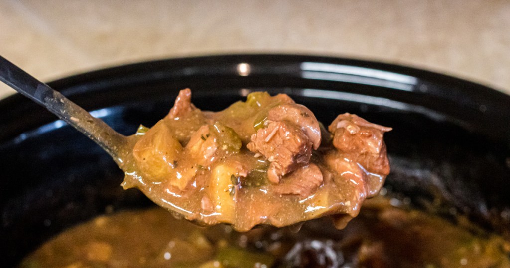 Spoonful of keto beef stew out of the crockpot