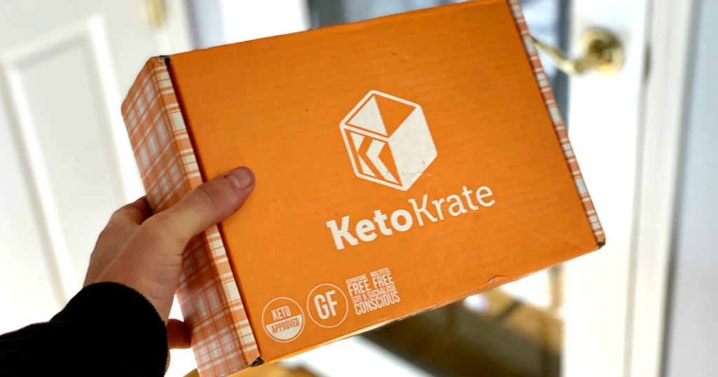 holding Keto Krate orange box 