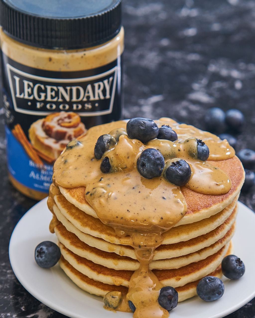 Legendary foods almond butter on pancakes with blueberries 