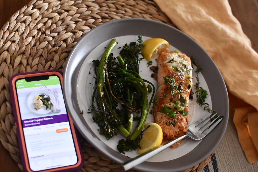 salmon on plate with eMeals app open on iPhone 