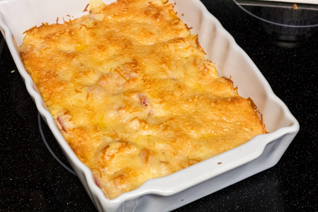 Keto Chicken Cordon Bleu Casserole dish on stove