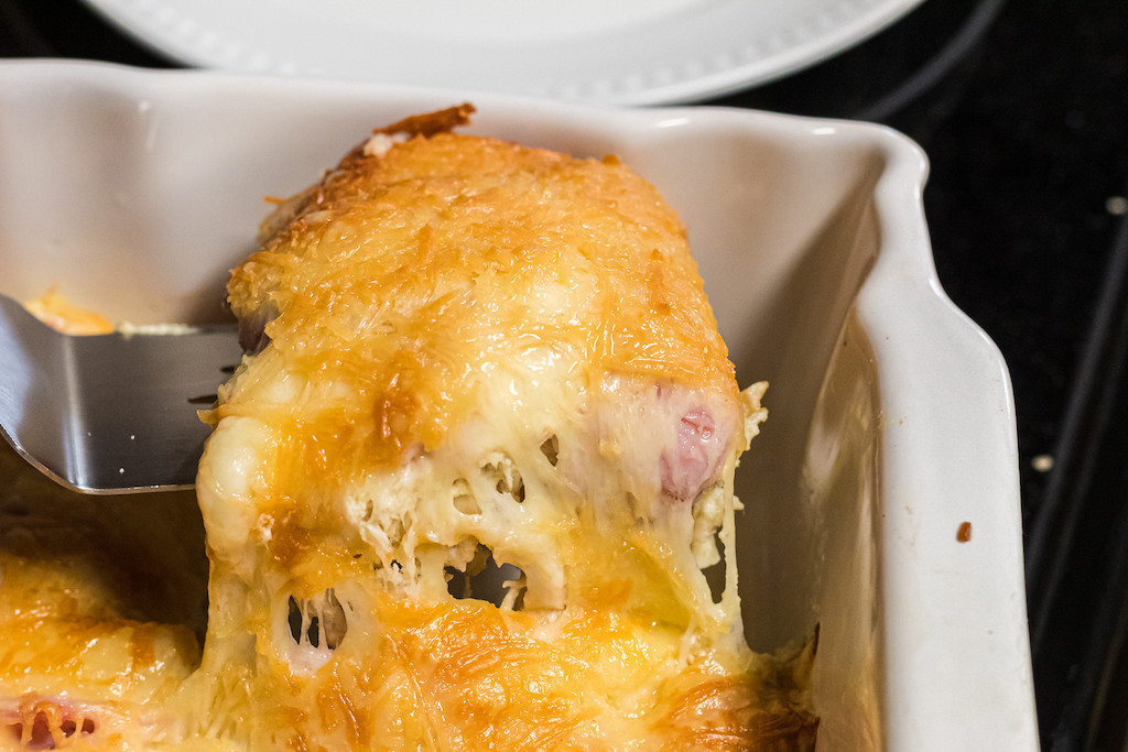 Taking Chicken casserole out of dish with spatula 