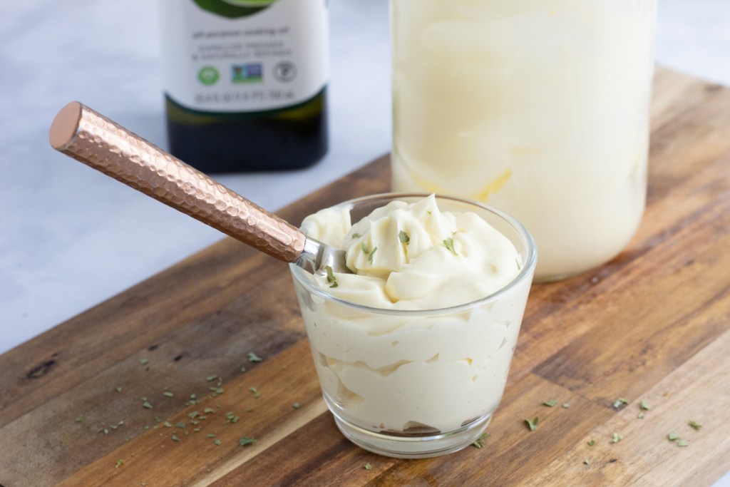 keto mayo in cup with knife 