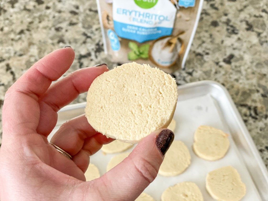 keto sweetener taste test with erythritol blend holding a cookie