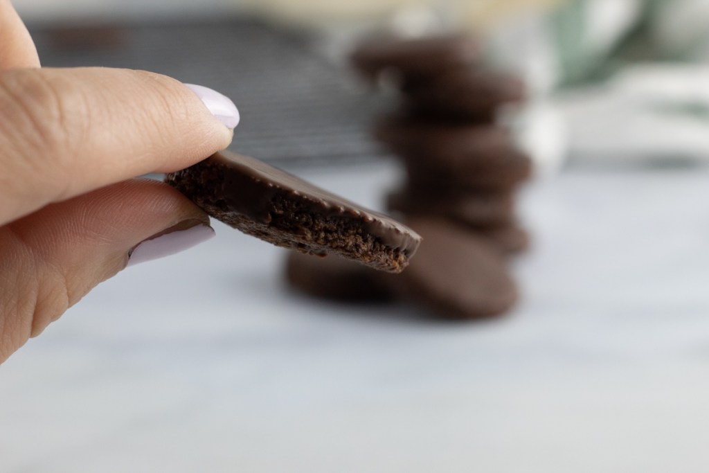 holding a thin mint cookie bite