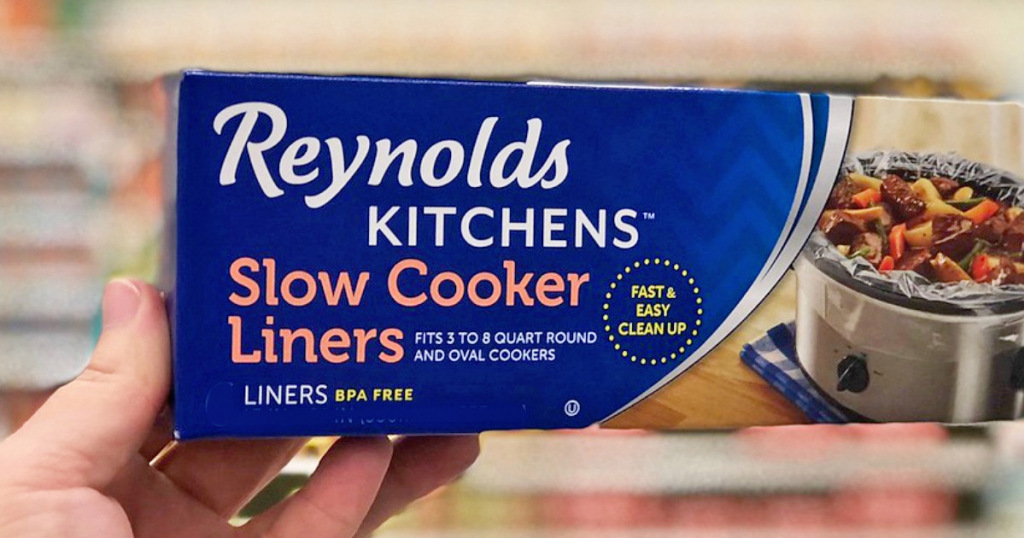 hand holding slow cooker liners