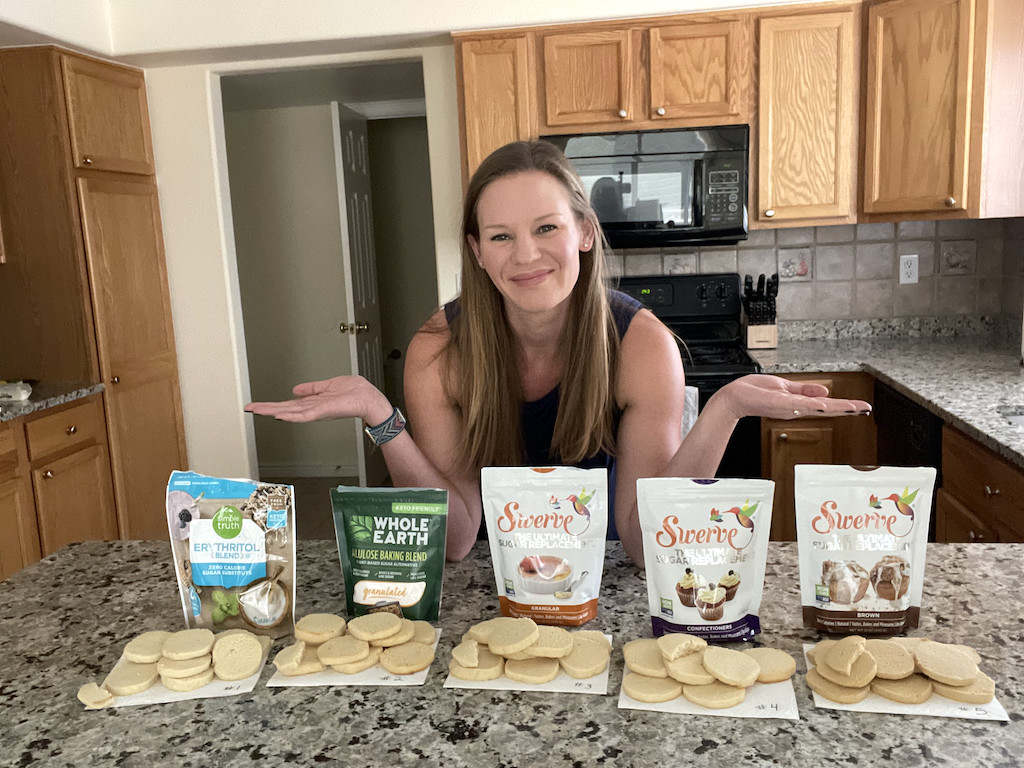woman standing behind keto sugar cookies taste test with different sweeteners
