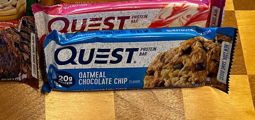 oatmeal chocolate chip quest bar on table