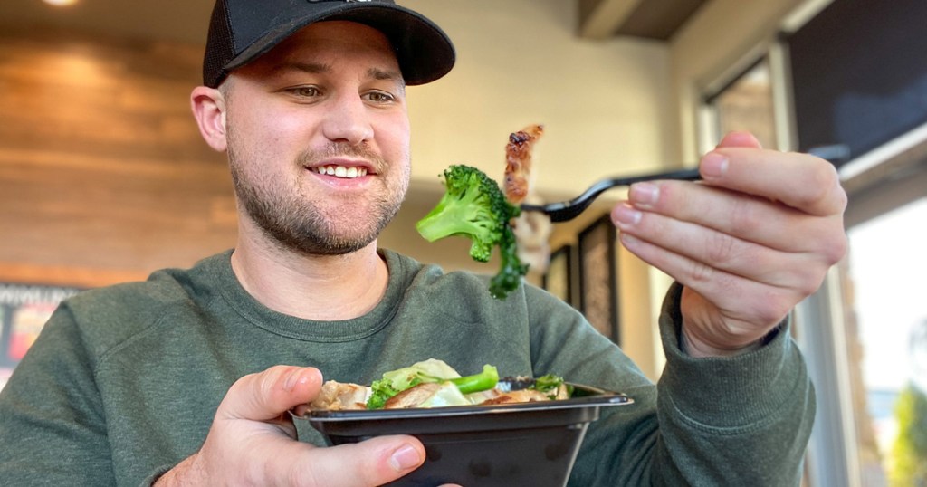 man eating Panda Express