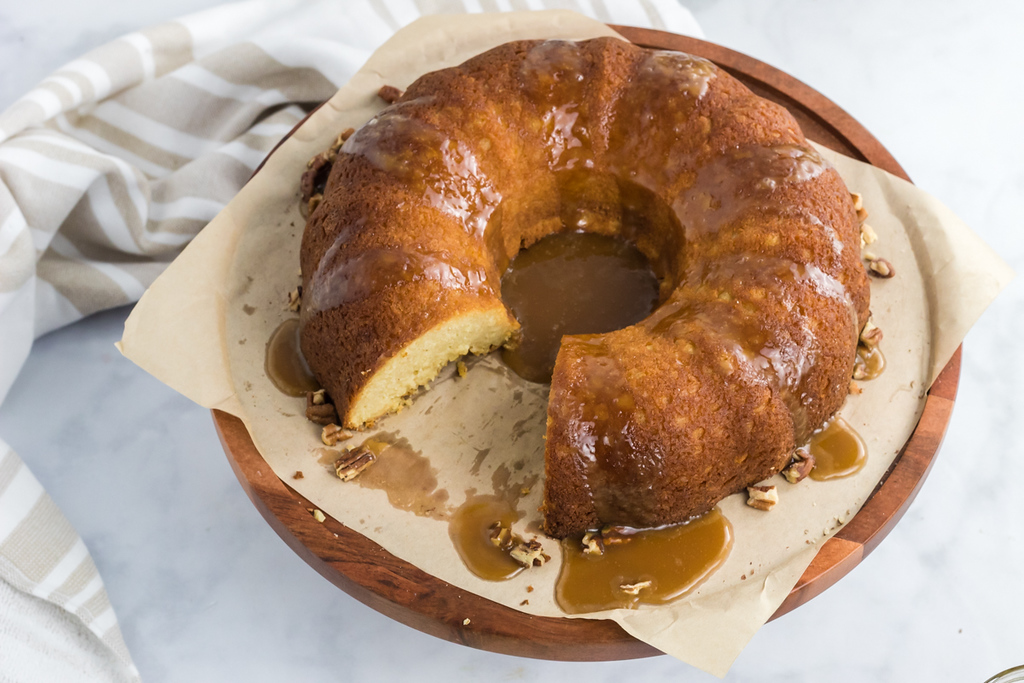 caramel bundt cake on cutting board