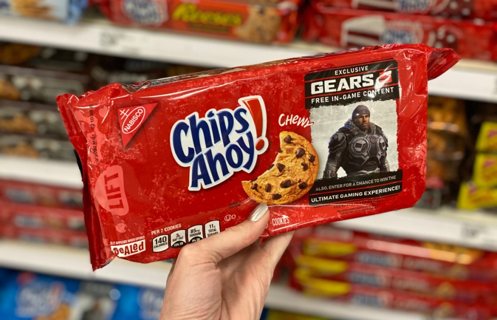 Hand holding a package of chips ahoy cookies, one of the foods to avoid on keto and low carb diets