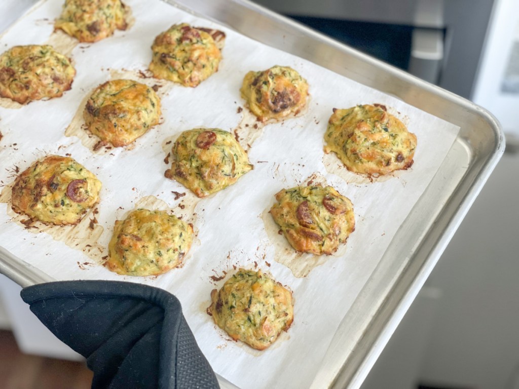 baked zucchini pizza bites on baking sheet