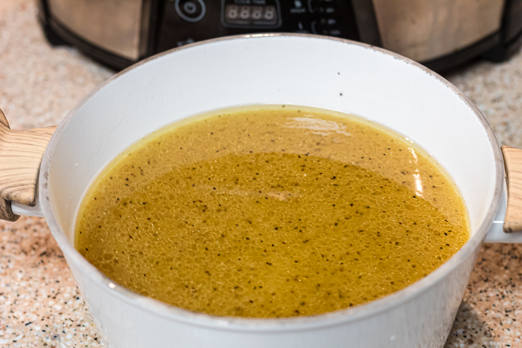 seasoned homemade bone broth in pot