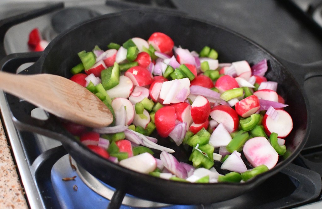 breakfast burrito ingredients in skillet